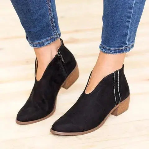 Black V-cut ankle boots for women, sleek faux leather silhouette with versatile everyday style