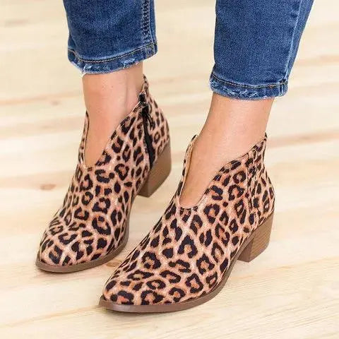 Black v-cut ankle boots for women, sleek faux leather silhouette with versatile everyday style