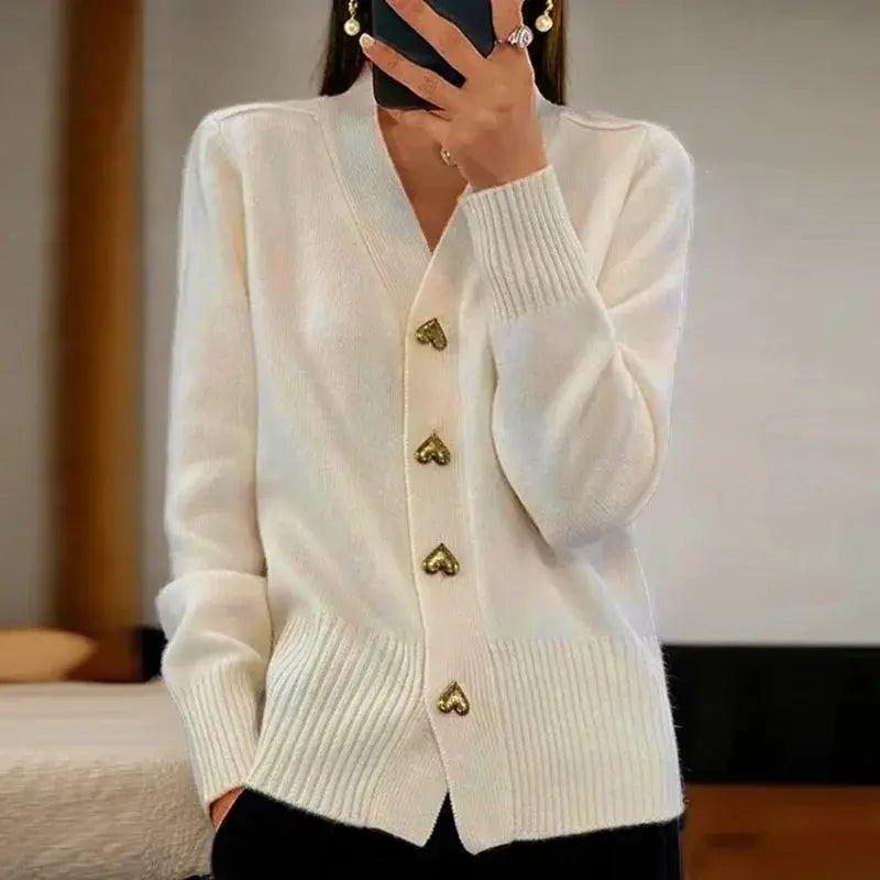 Women's cozy V-neck cardigan elegant silhouette with decorative buttons timeless layering piece