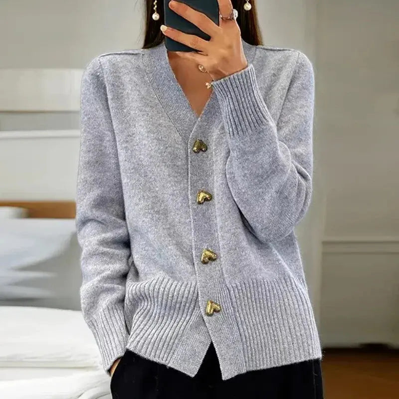 Women's cozy V-neck cardigan elegant silhouette with decorative buttons timeless layering style