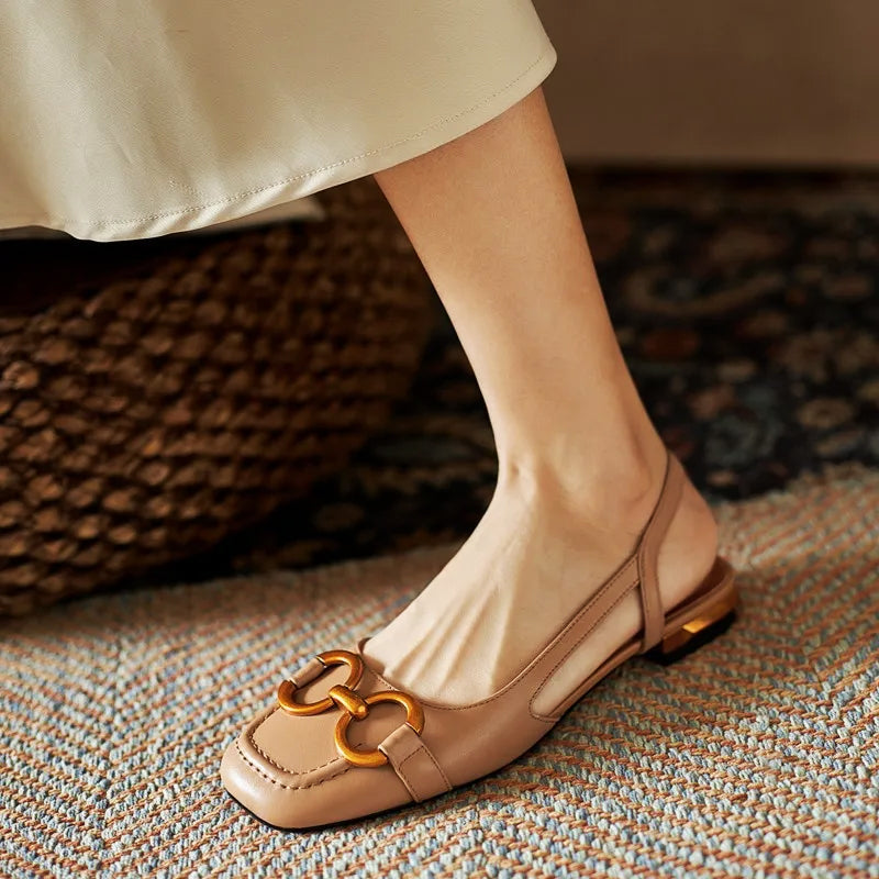 Valentina Rossi Belvì beige slingback flats with open-back design and bold oversized chain accent