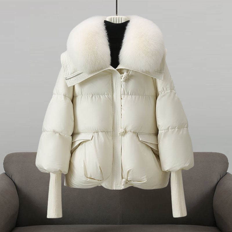 Women's oversized quilted puffer jacket with faux fur collar and toggle closure for chilly days