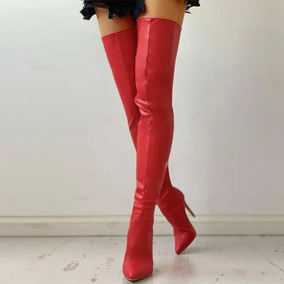 Black vegan leather stiletto boots with sleek leg-hugging silhouette and towering heel