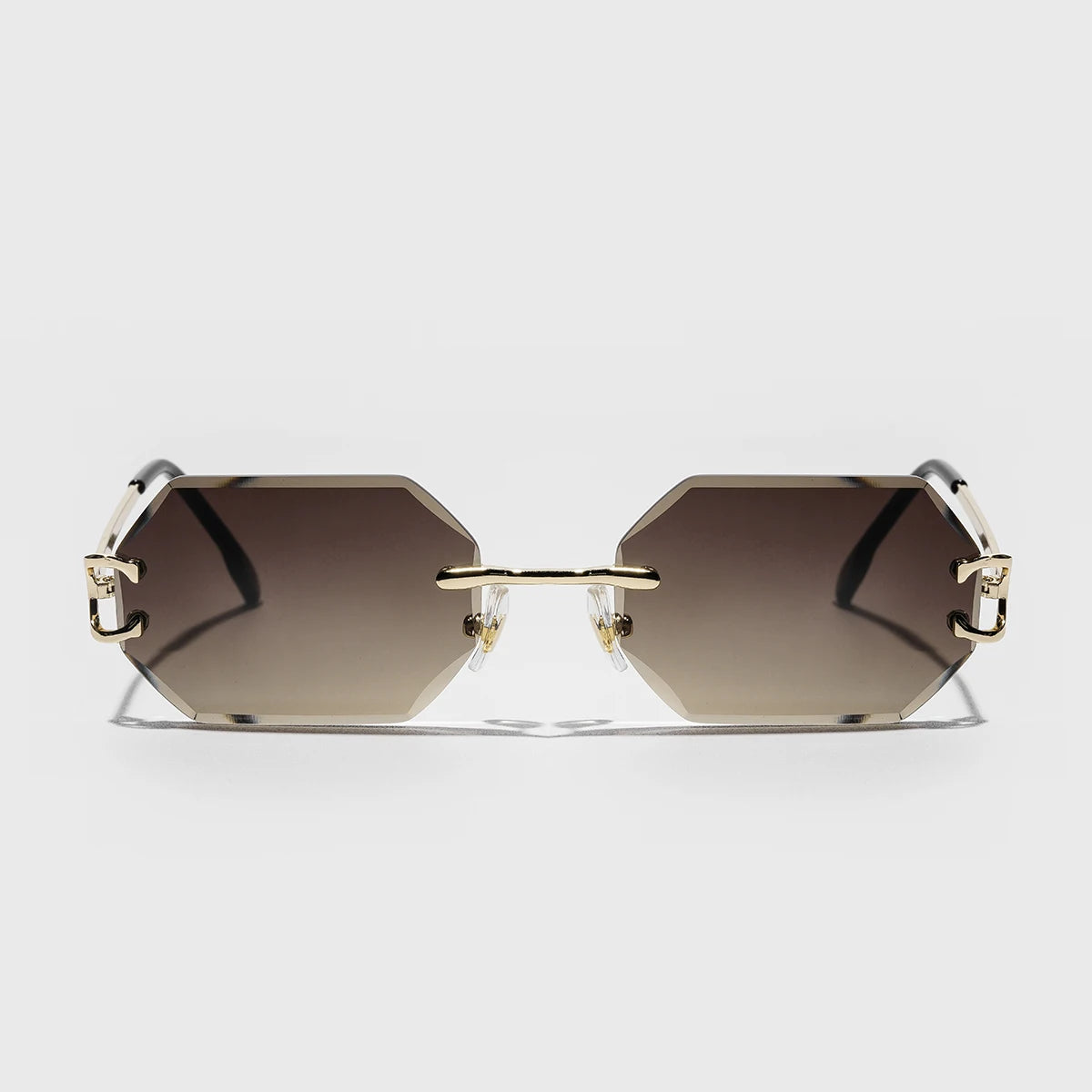 Rimless octagonal sunglasses with UV400 gradient tint, sleek metal temples, minimalist geometric style