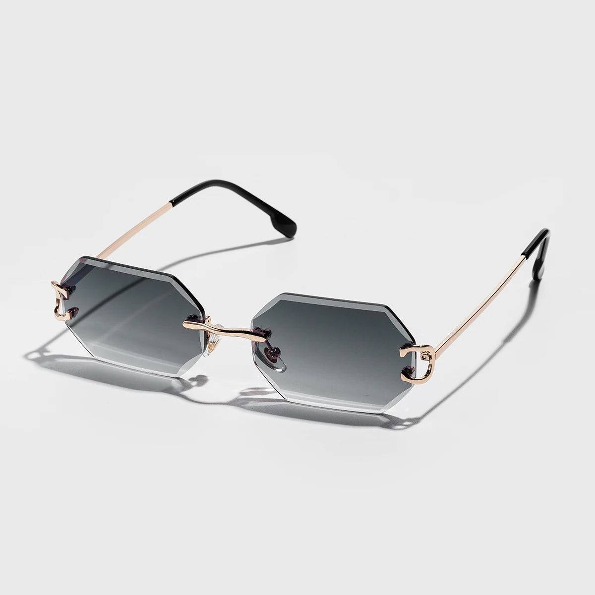 Rimless octagonal sunglasses with UV400 gradient tint and sleek silver metal temples