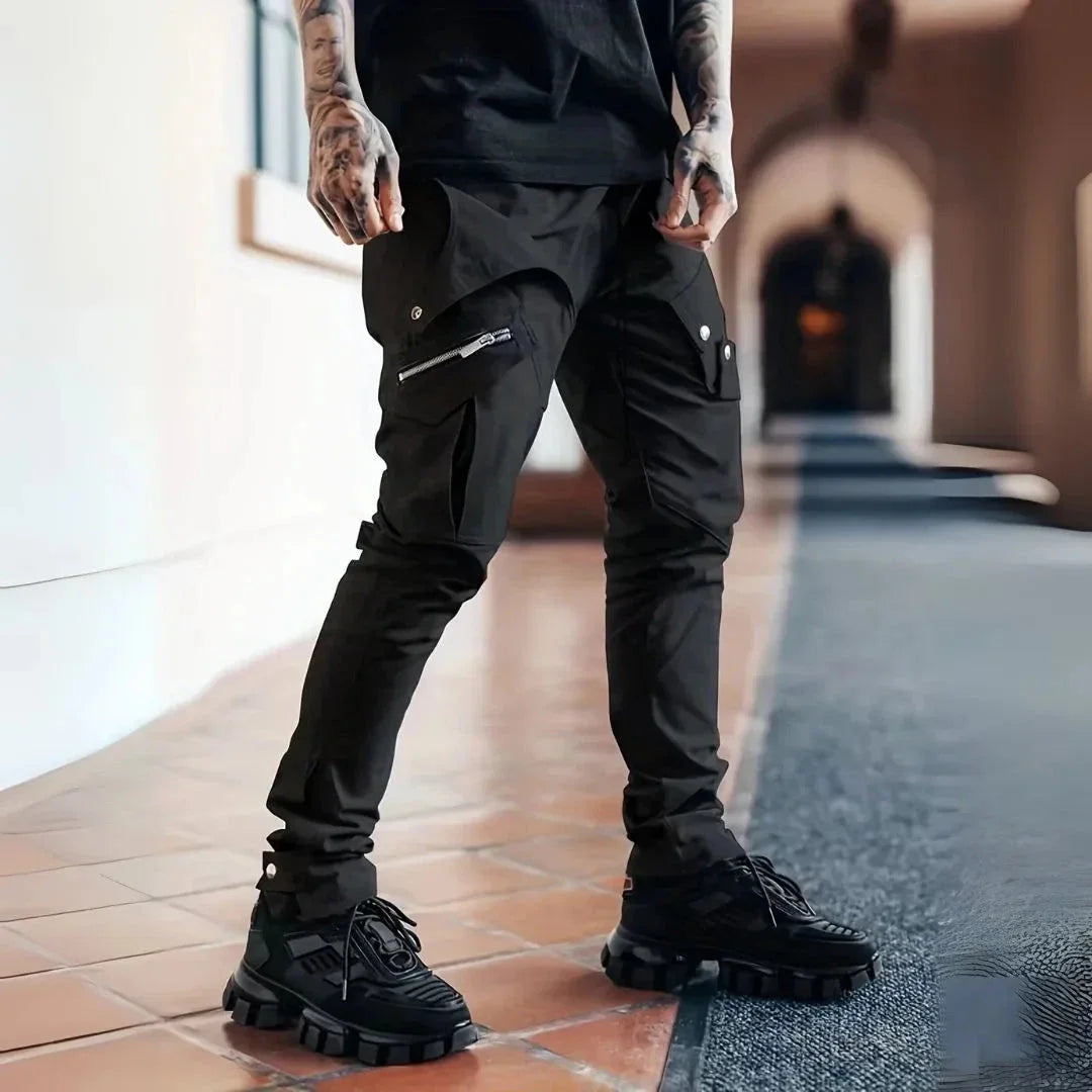 Men's slim tapered cargo pants in urban style with multi-pocket design and zip closure