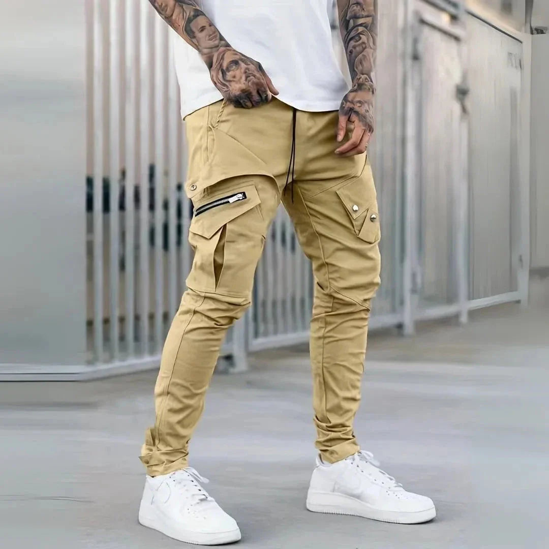 Men's slim tapered cargo pants in urban style with multi-pocket design and zip details