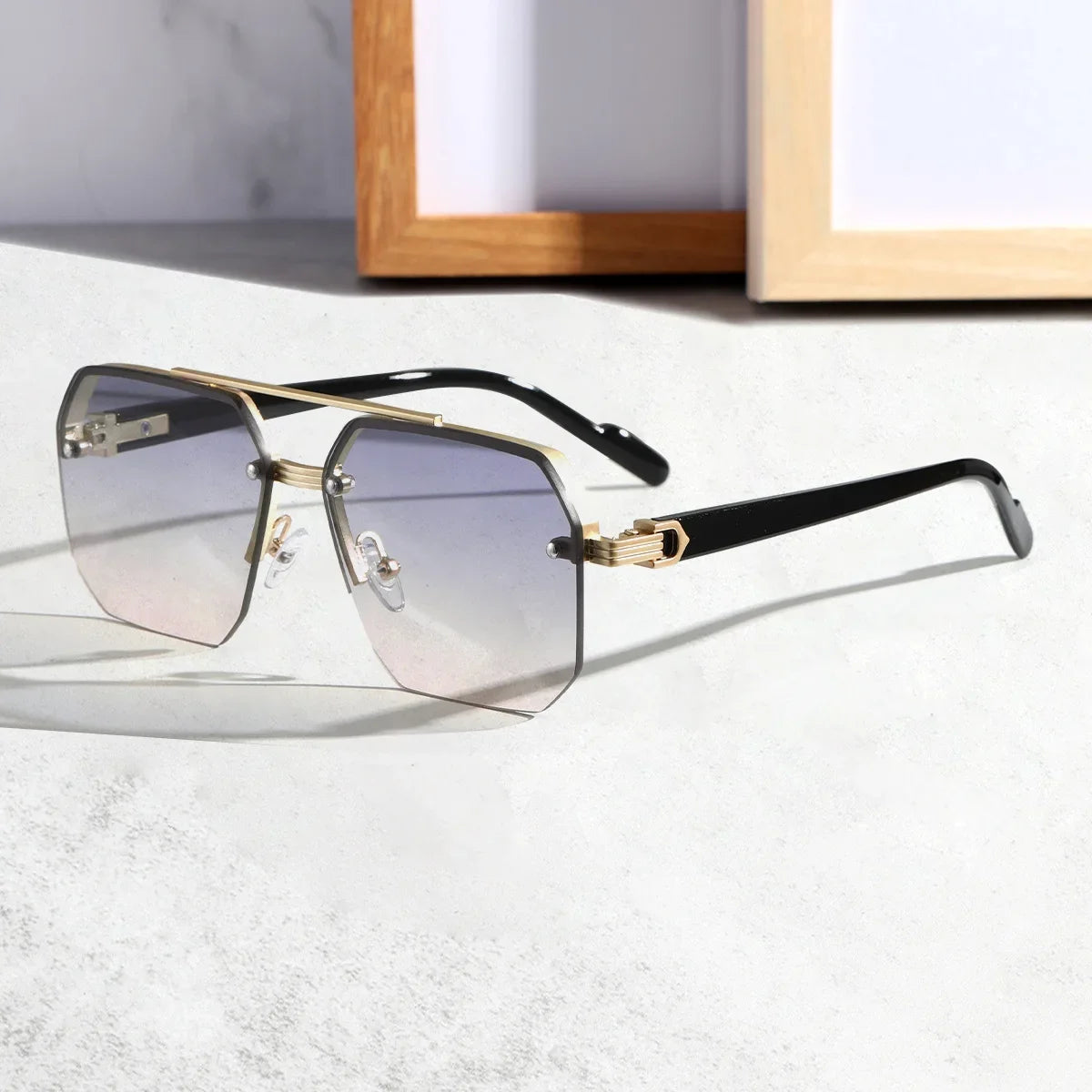 Vanguard Hex frameless geometric sunglasses with sleek metal bridge and UV400 gradient lenses