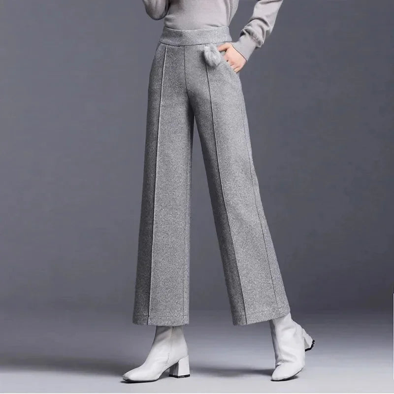 Vellana high-rise wide-leg wool trousers in classic neutral with front seam detail
