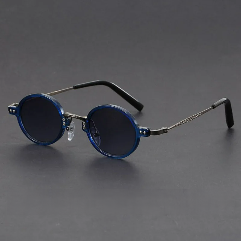 Vera vintage round sunglasses with glossy acetate frame, metal arms, and UV400 retro-chic lenses