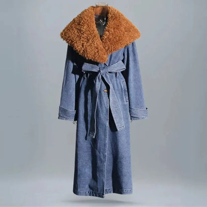 Women's longline denim coat with oversized faux fur collar, belted waist, and wide cuff sleeves