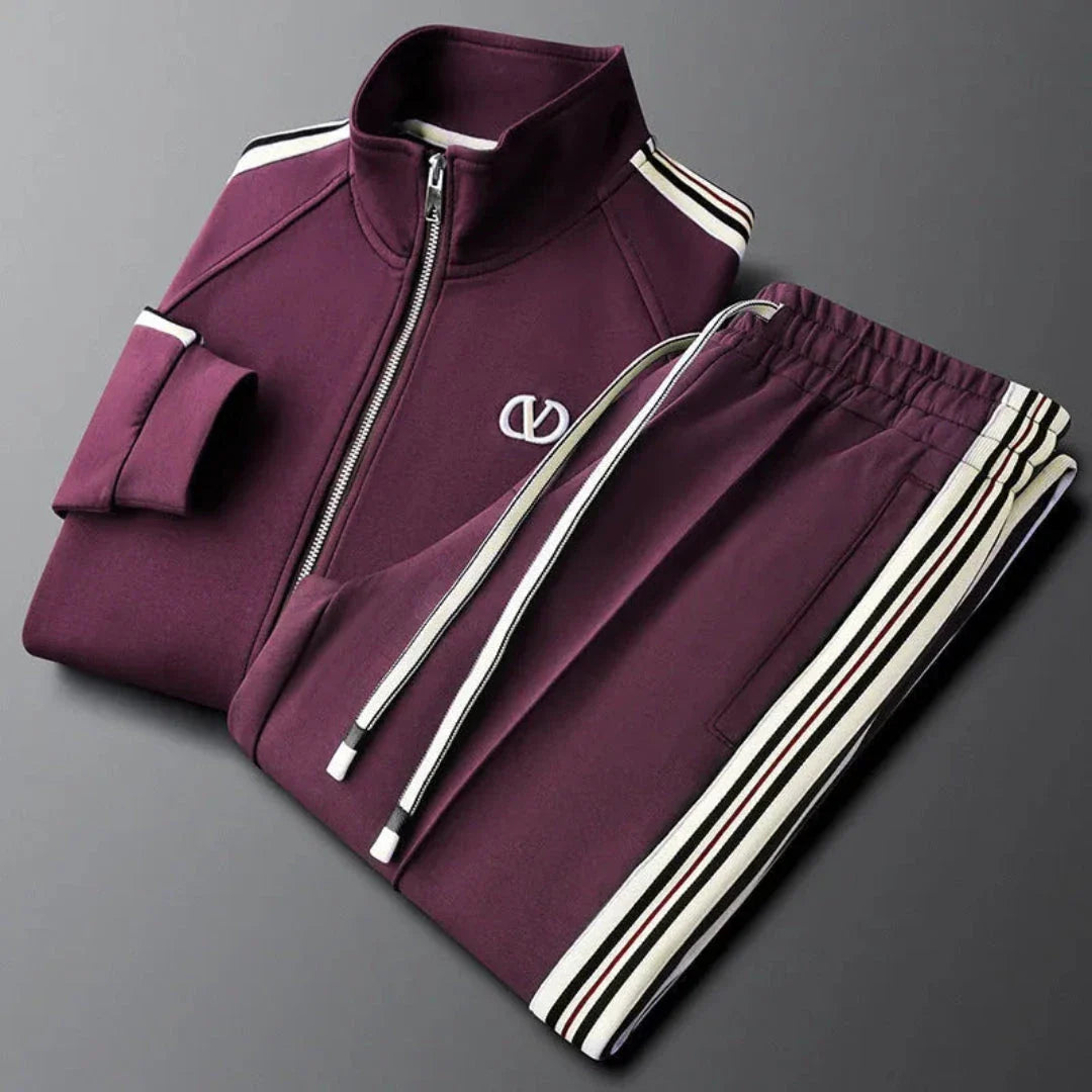 Black full-zip tracksuit set with sleek contrast side stripes and modern athletic fit