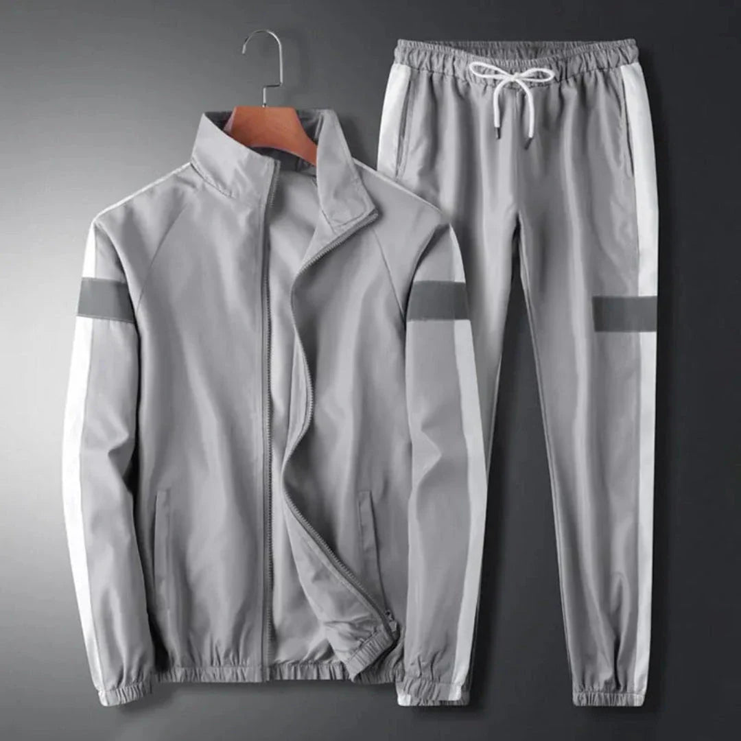 Men's two-piece tracksuit with reflective stripes, bold side panels, athletic cut casual sport set