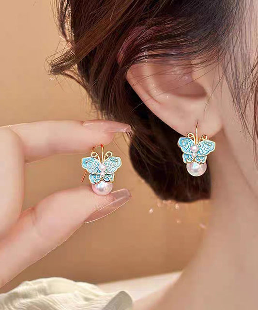 Boucles d'oreilles à tige vintage en alliage de cuivre bleu avec perles et papillon en émail - Wavlynn