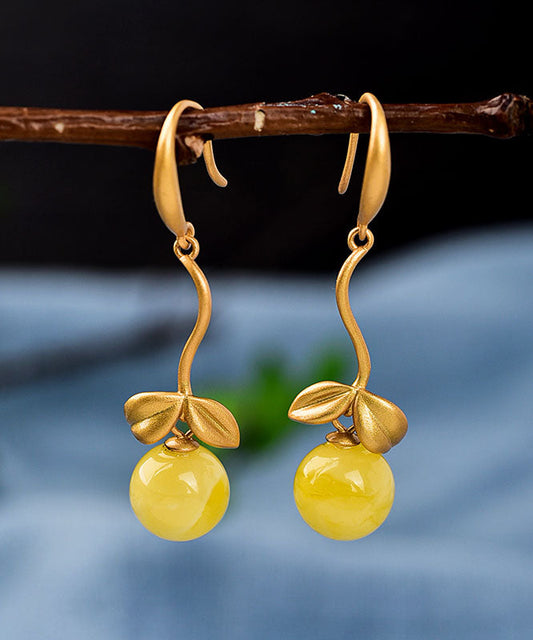 Boucles d'oreilles pendantes vintage en argent surmonté d'or et de cire d'abeille. - Wavlynn