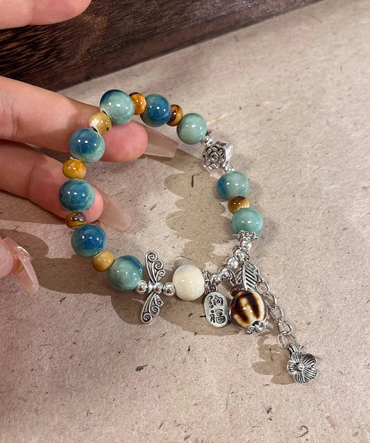 Bracelet à breloques vintage en soie, argent sterling, jade et céramique - Wavlynn
