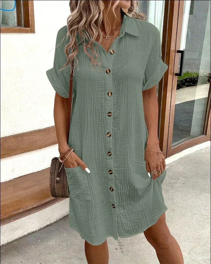 Relaxed cotton polo shirt dress in neutral tone with drapey silhouette and classic collar detail
