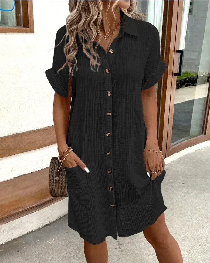 Relaxed white cotton polo shirt dress with drapey silhouette and button-front collar detail