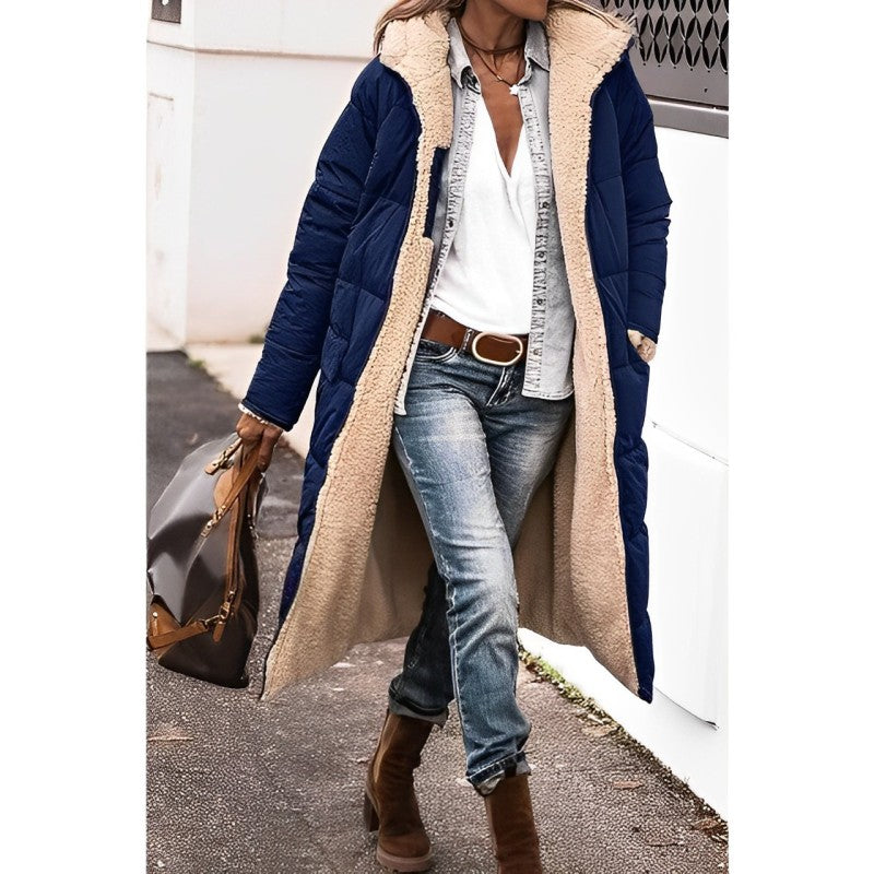 Women's black oversized quilted padded long coat with soft lining and elegant stitched pattern