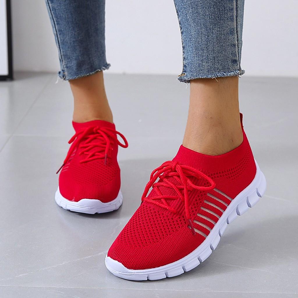 Women's breathable knit slip-on sneakers with integrated laces and shock-absorbing sole for active wear