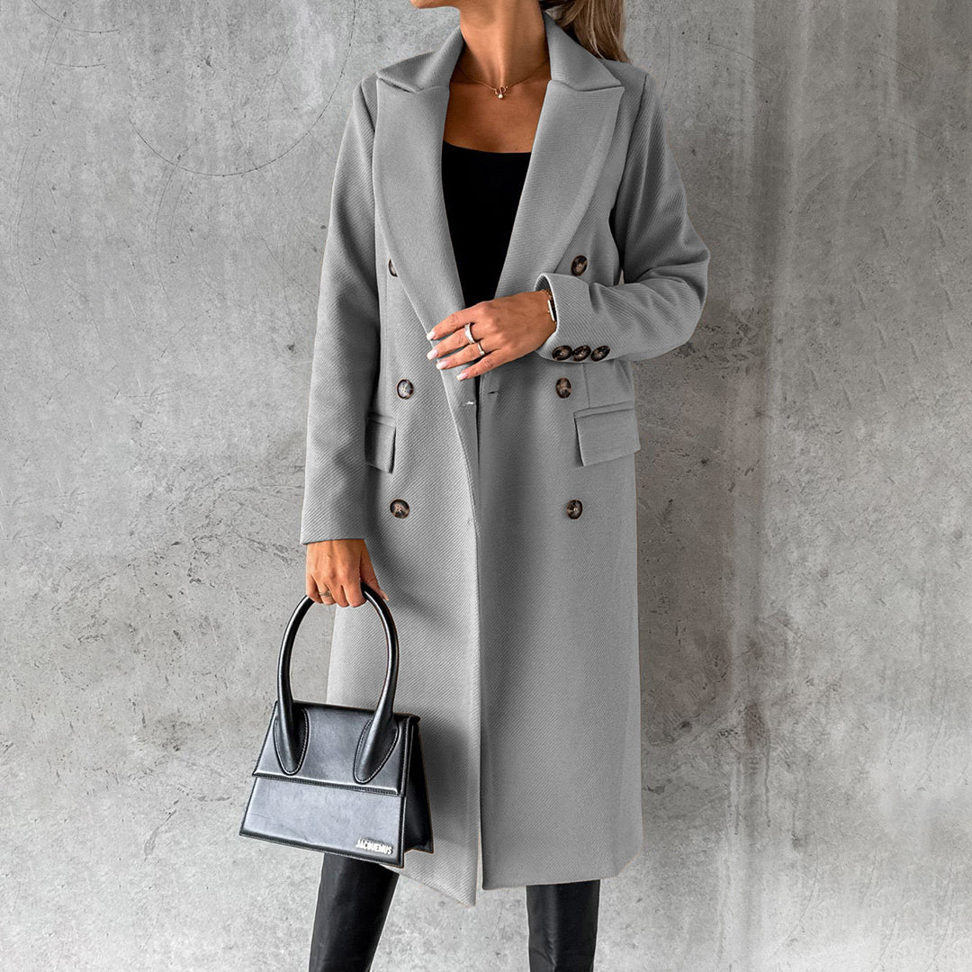 Women's long double-breasted wool blend coat elegant tailored silhouette with flap pockets
