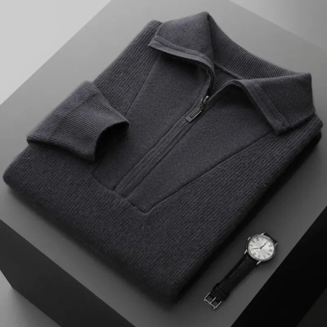 Cream cashmere half-zip sweater with rib-knit texture and distinctive V-panel front detail