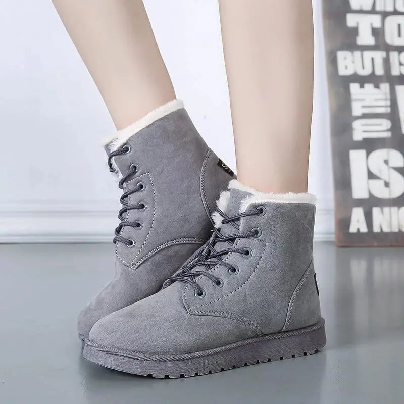 Women's mid-calf synthetic leather winter boots, stylish cold-weather footwear with rugged snow-ready durability