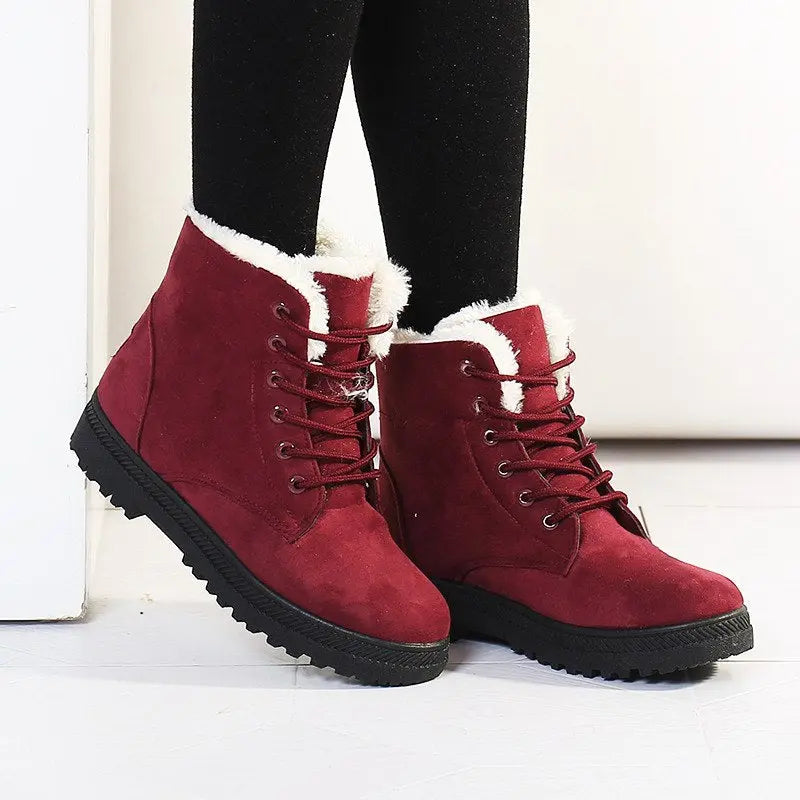 Women's mid-calf synthetic leather winter boots, stylish cold-weather design with snow-ready durability