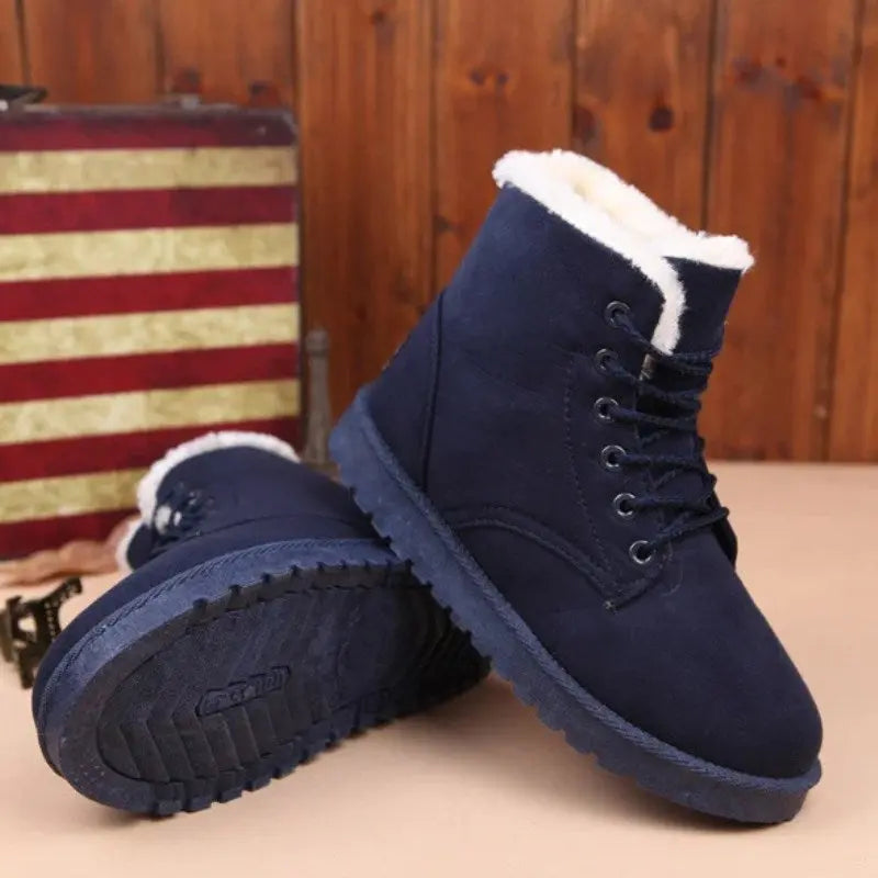 Women's mid-calf synthetic leather winter boots, stylish cold-weather design with rugged snow-ready durability
