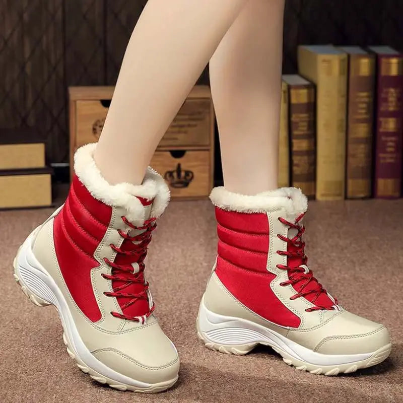 Women's waterproof winter boots in black synthetic leather, warm insulated lace-up style for cold weather