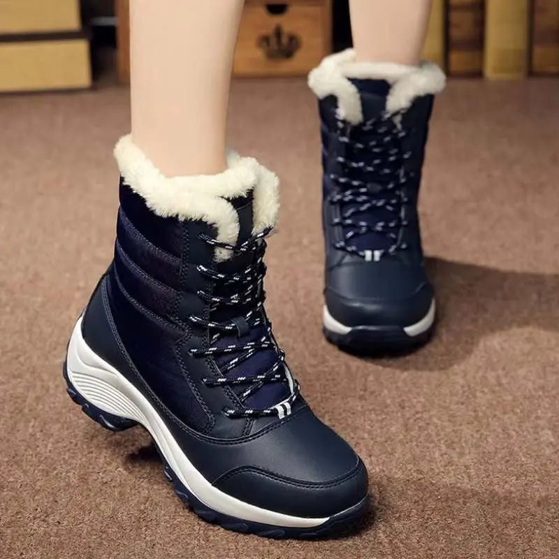 Women's waterproof winter boots in synthetic leather, warm structured silhouette for cold weather