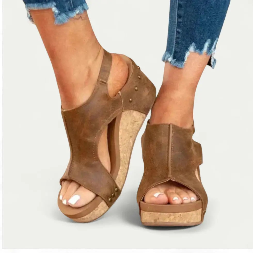 Women's beige wedge sandals with cushioned insole, lightweight sole, and stylish vacation-ready strap design