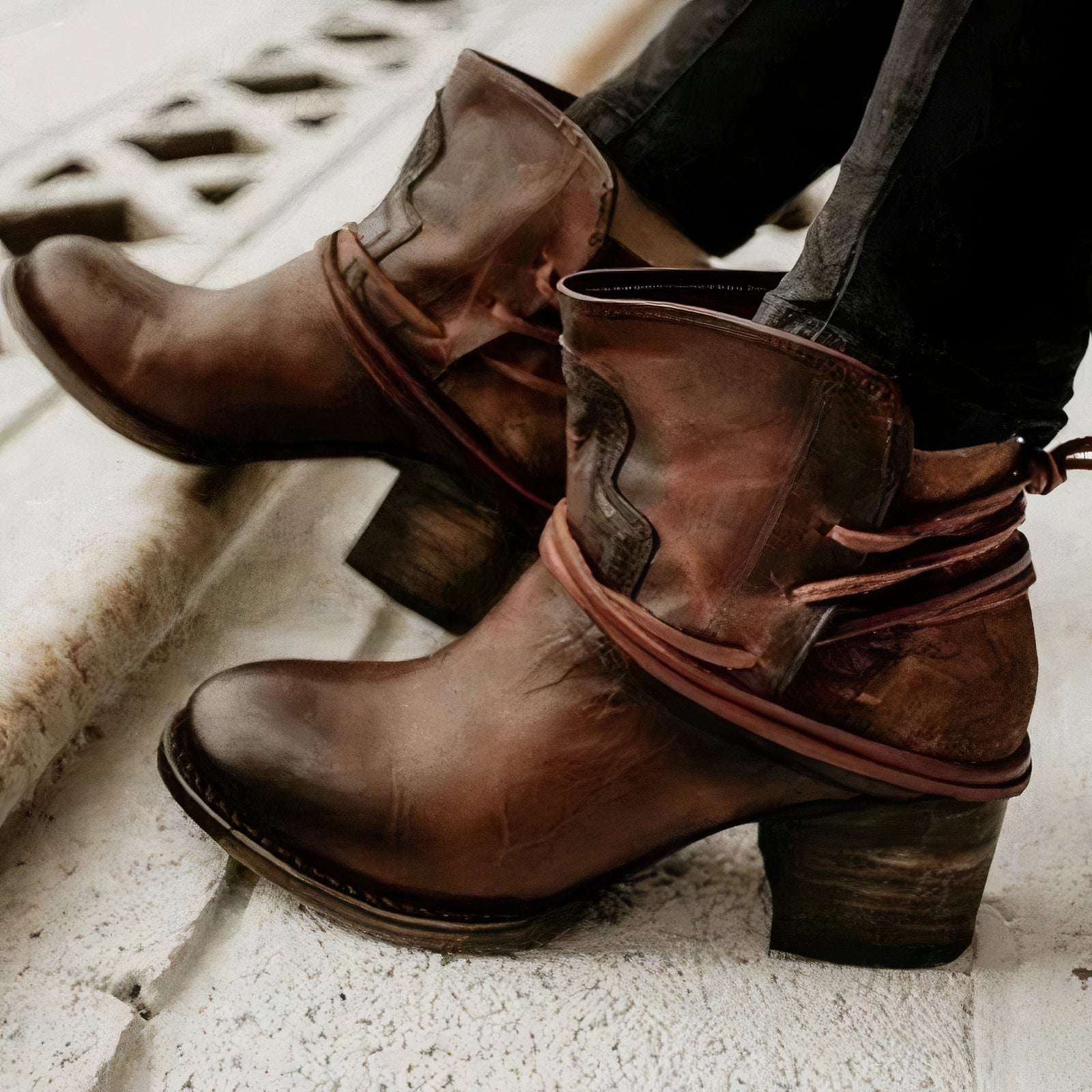 Women's brown leather Western ankle boots with block heel and wrapped lace detailing