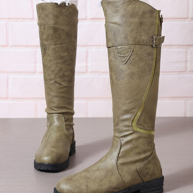 Black high boots sleek silhouette leg-lengthening design for bold sophisticated everyday style