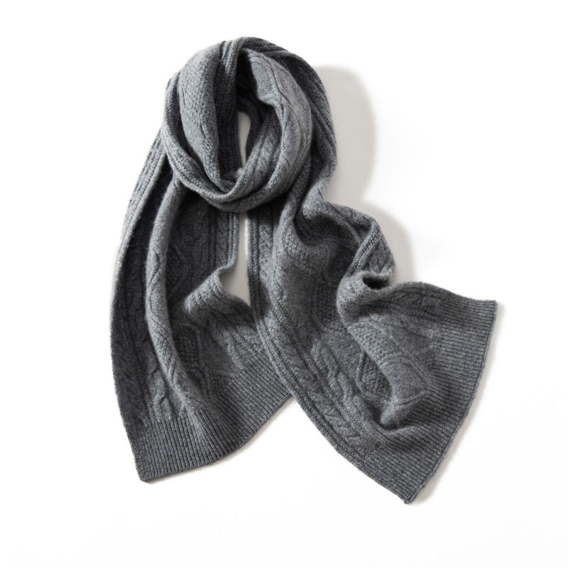Ivory cable-knit cashmere scarf with textured sculptural pattern and generous drape