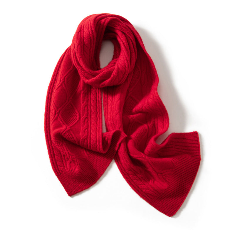 Ivory cable-knit cashmere scarf with textured sculptural pattern and generous drape