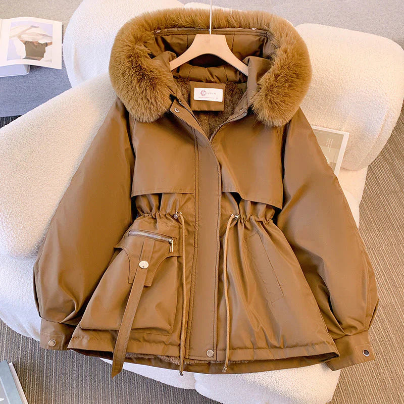 Women's water-repellent parka jacket with fur trim hood and adjustable waist for cozy winter warmth