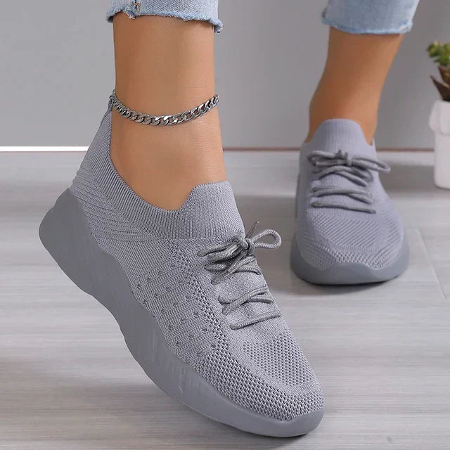 Women's lightweight slip-on knit sneakers with adjustable laces, breathable upper for everyday comfort