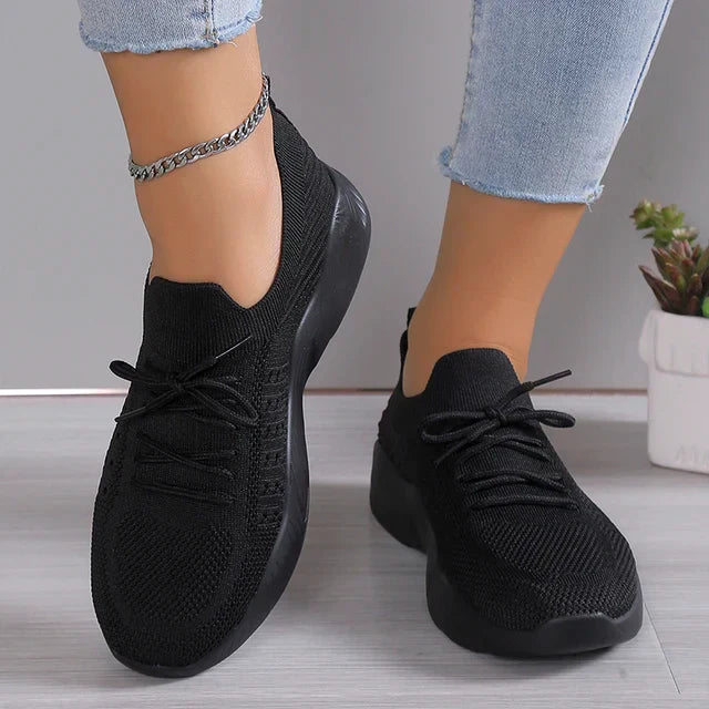 Women's lightweight slip-on knit sneakers with adjustable laces, breathable design for everyday comfort
