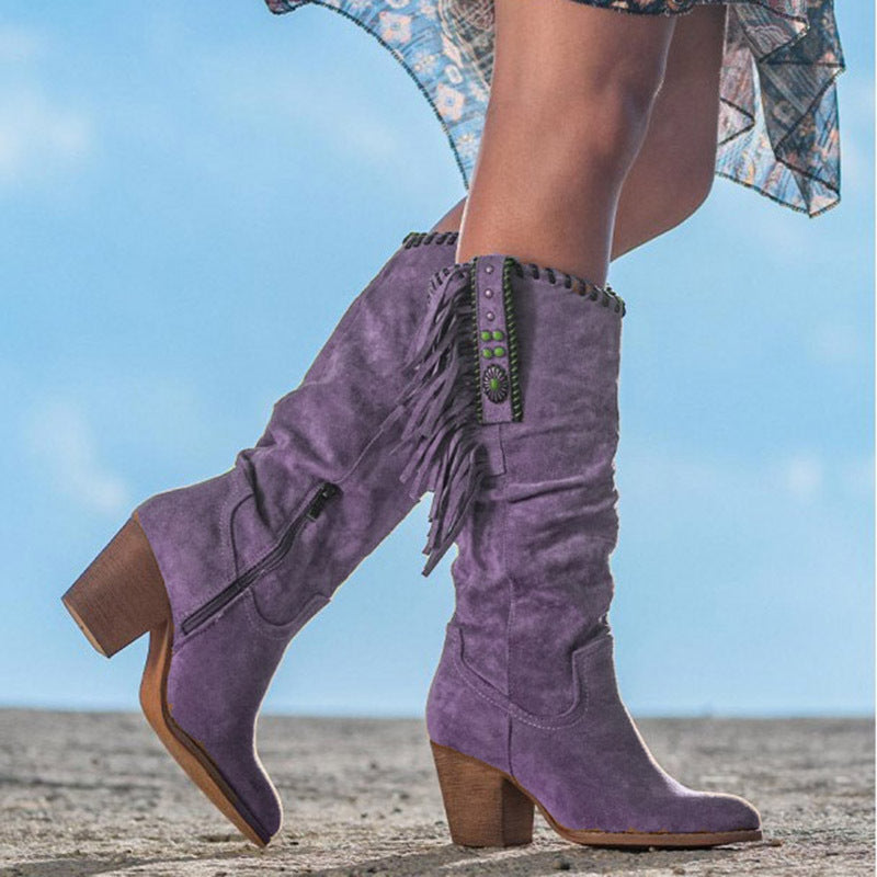 Women's suede knee-high Western boots with fringe tassels, turquoise accents, and braided trim
