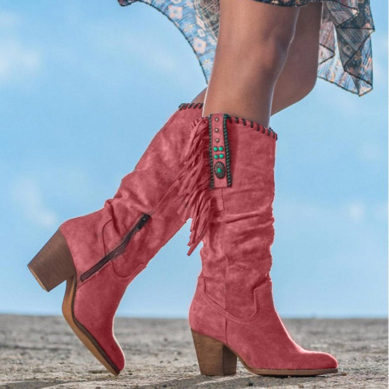 Women's suede knee-high Western boots with fringe tassels, turquoise accents, and braided trim