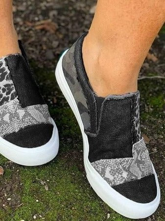 Women's white slip-on platform sneakers with minimalist design for casual everyday wear