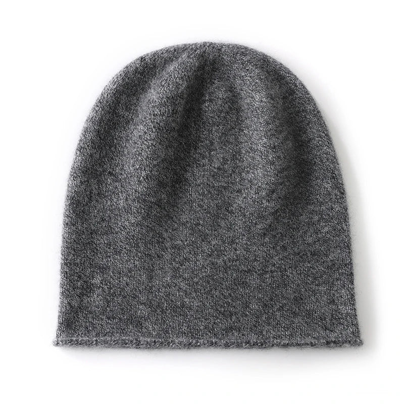 Women's ivory cashmere blend slouch beanie with minimalist knit silhouette and natural drape