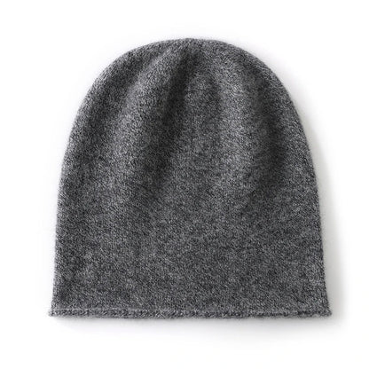 Women's ivory cashmere blend slouch beanie with minimalist knit silhouette and natural drape