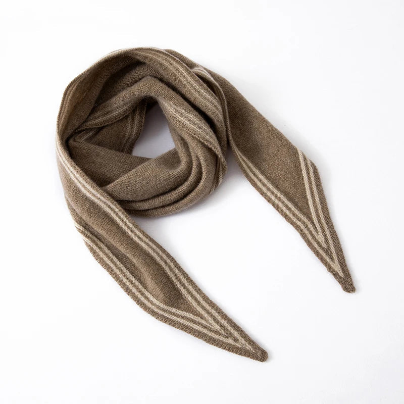 Women's slim cashmere knit scarf in beige with black contrast stripe trim, elegant winter wrap