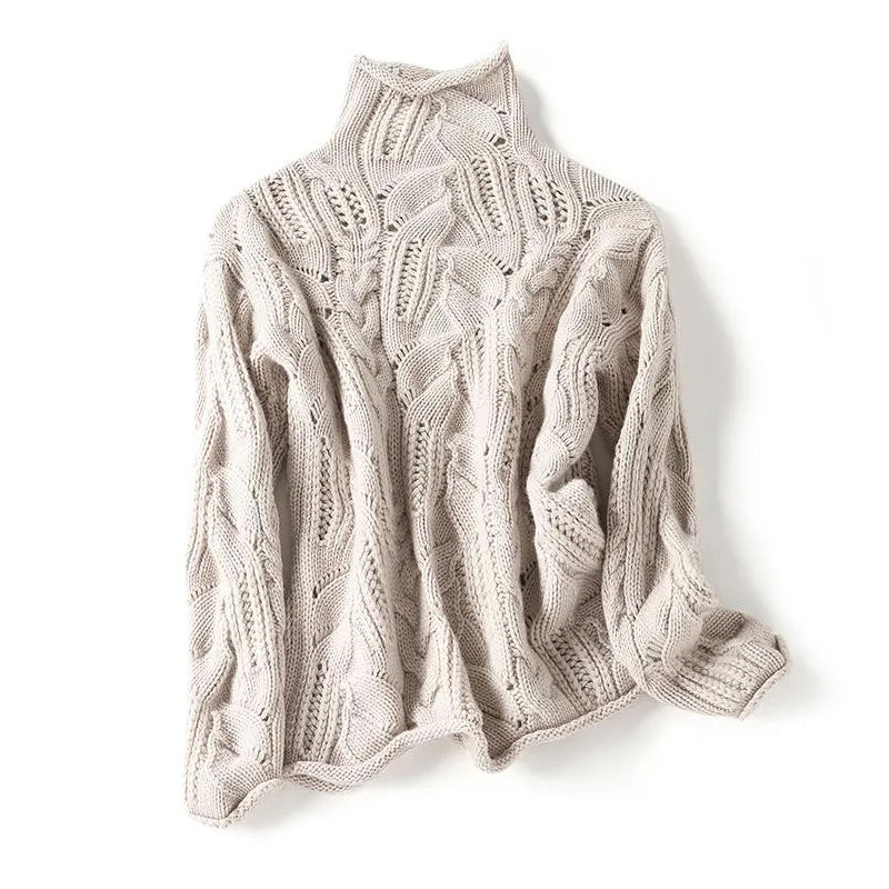 Women's loose cashmere turtleneck sweater in varied knit texture pattern, hip-length cozy winter style