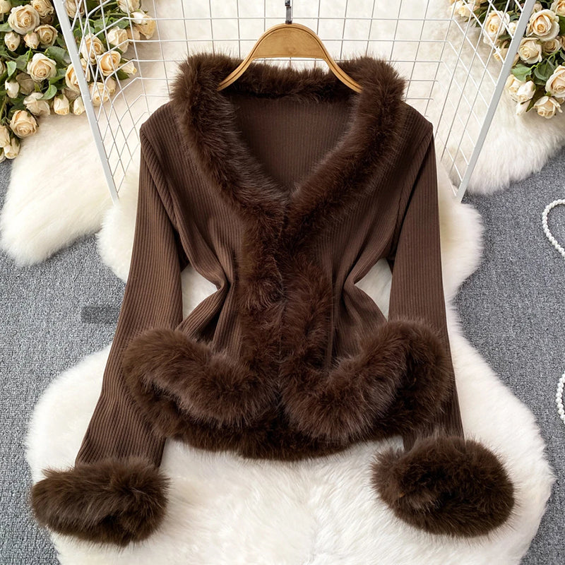 Women's elegant ribbed top with plush faux fur trim on neckline, cuffs and hem, regular fit