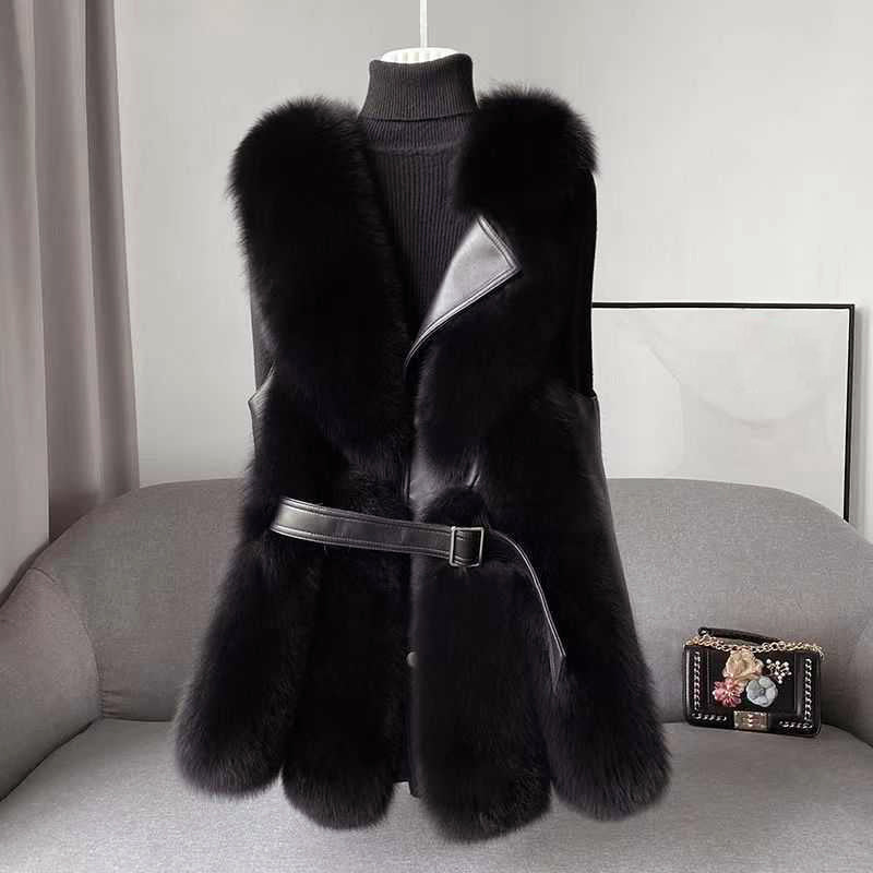 Women's ivory faux fur vest with belted waist, faux leather trim, sleeveless hip-length silhouette