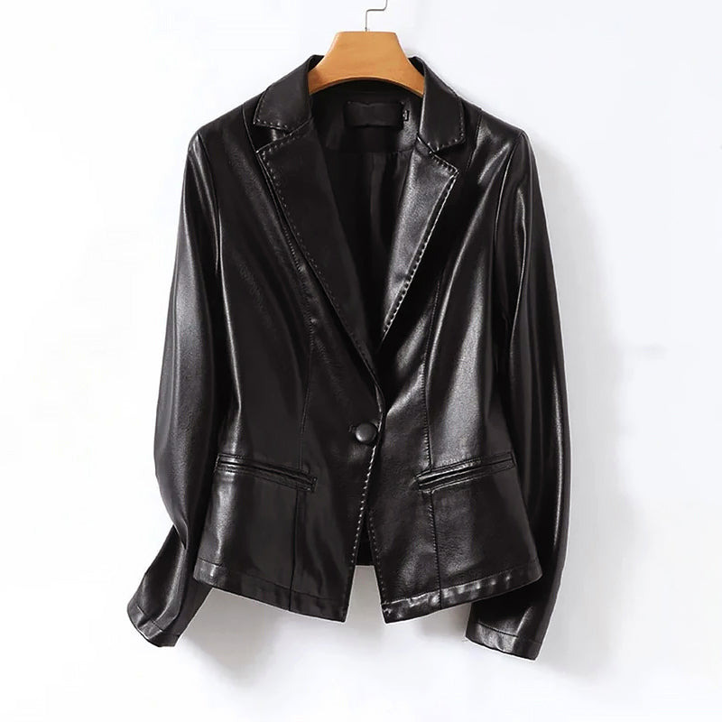 Women's vegan leather blazer jacket in sleek tailored cut with single button closure and notched lapel