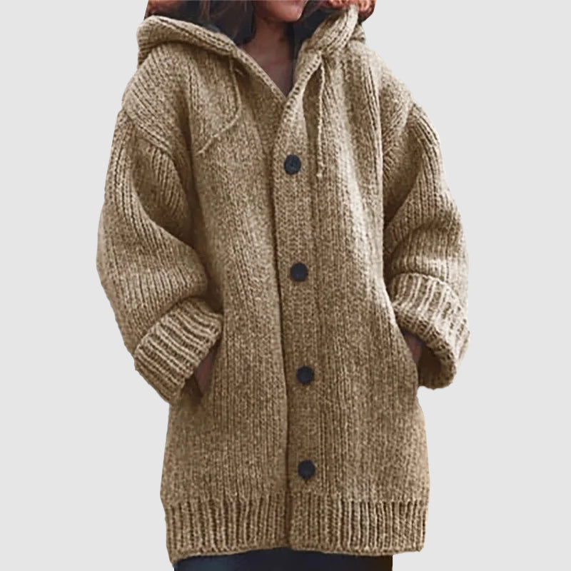 Women's beige oversized hooded chunky knit cardigan with relaxed mid-thigh length for cozy winter layering
